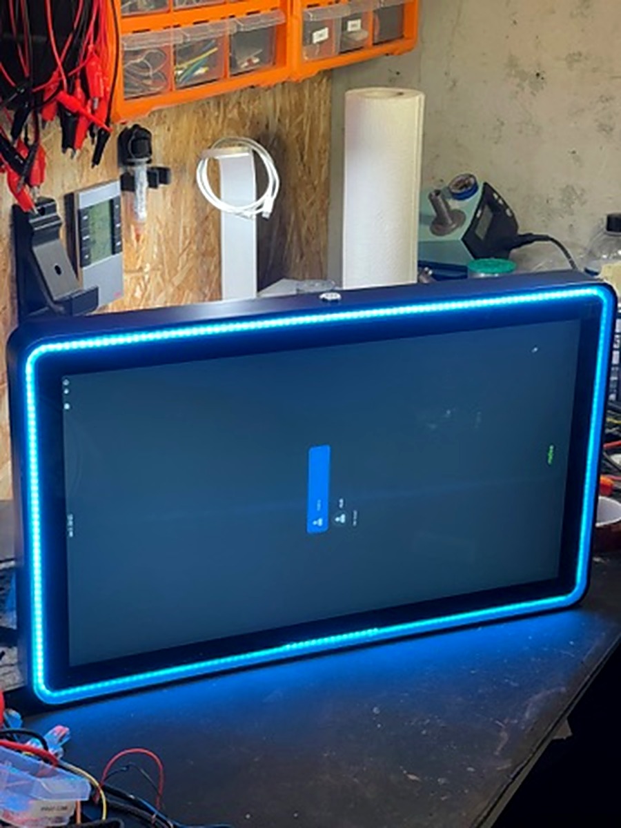 Genboard display front view powered on with blue addressable RGB LED perimeter lighting
