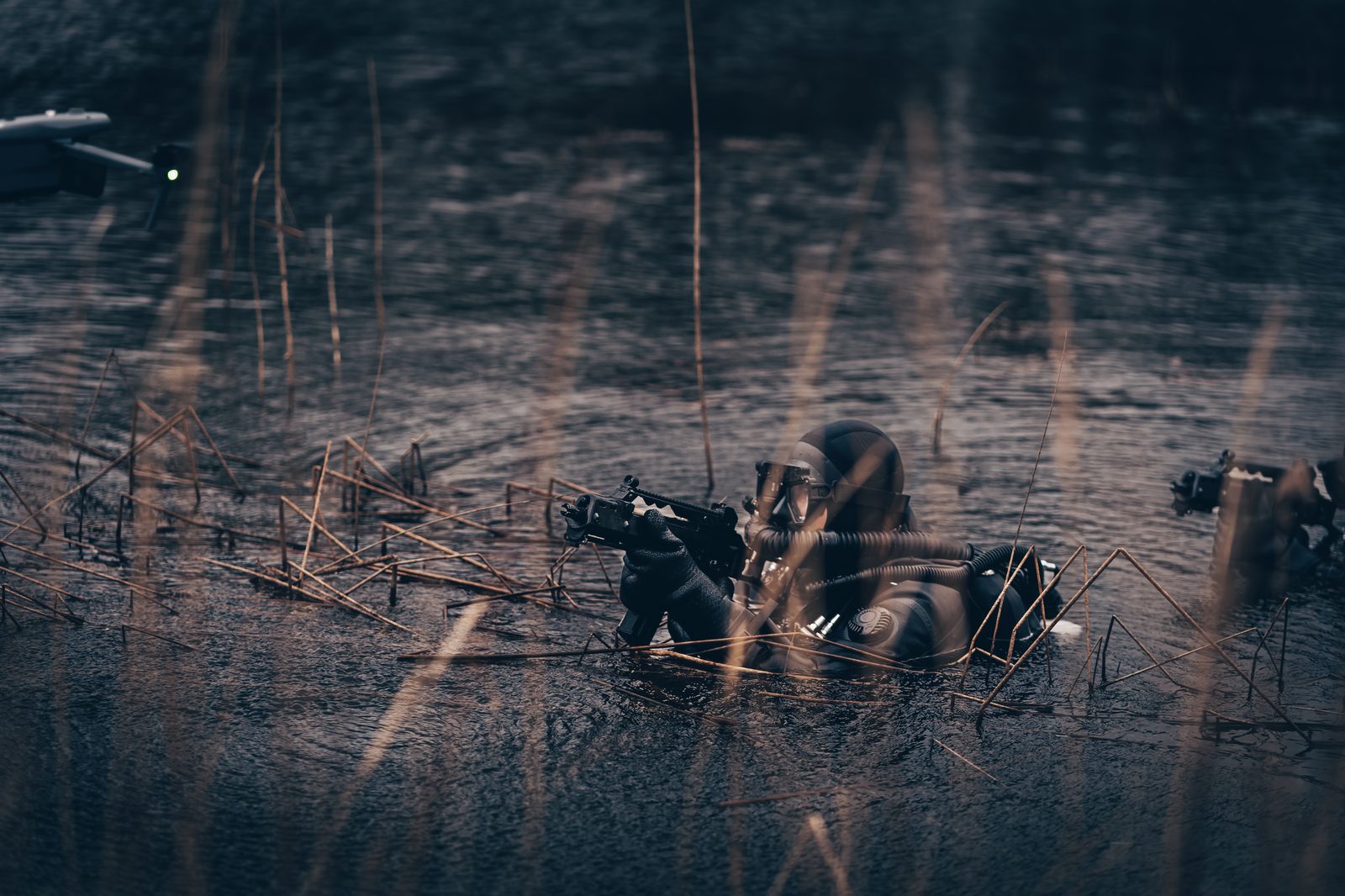 Tactical diver at water surface wearing Rheo Dive smart mask — field testing in real conditions