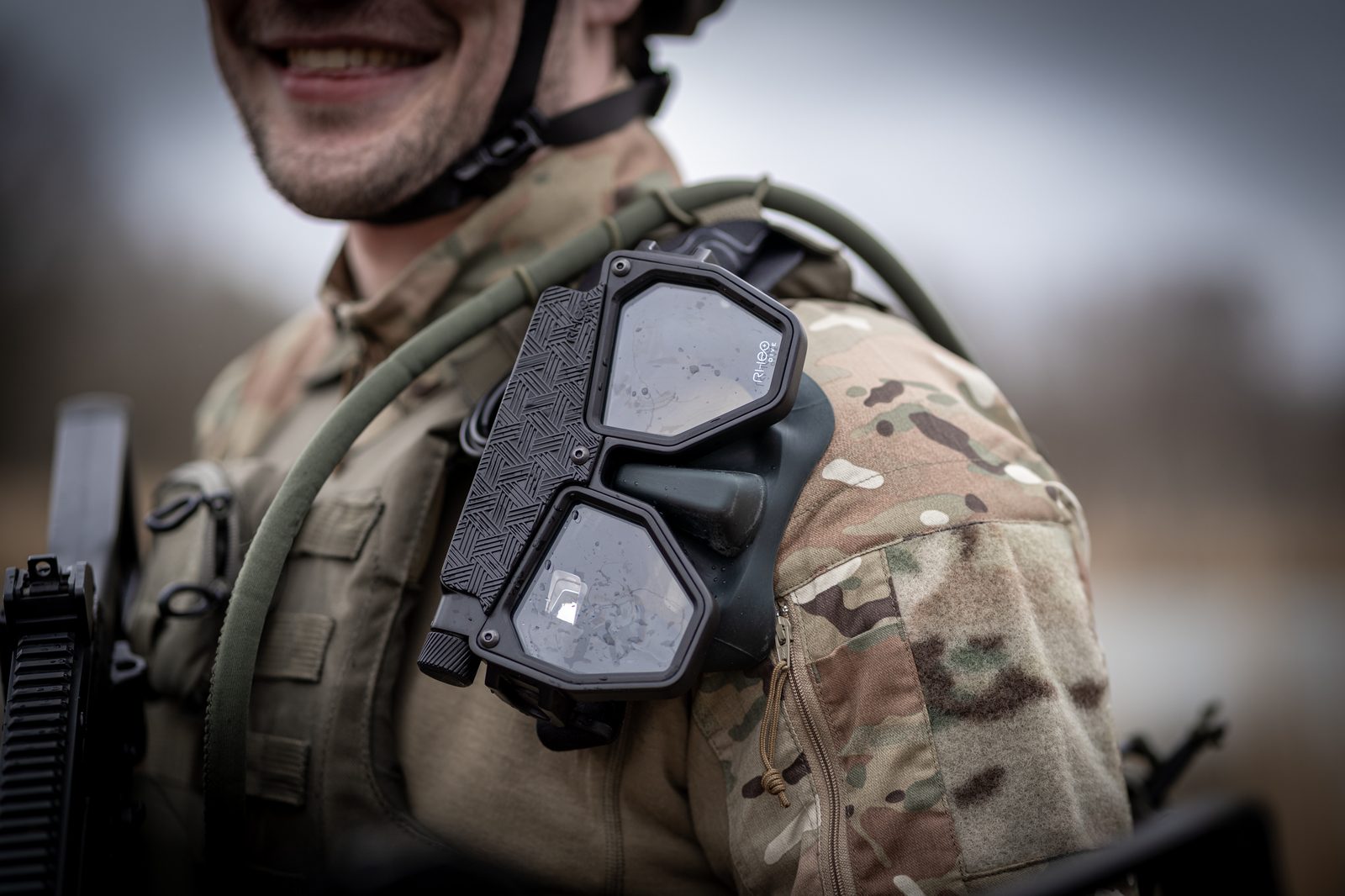 Rheo Dive mask clipped to tactical vest — product in operational context